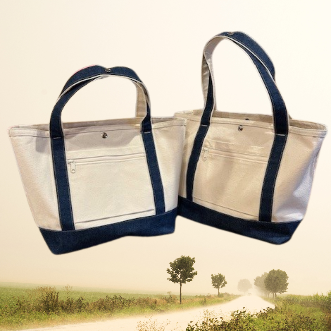 Two white Semen Tanks - Select Genetics Totes for Everyday Use with denim accents and your choice of 18 or 24 straps stand side by side on a misty rural road lined with trees and fields.