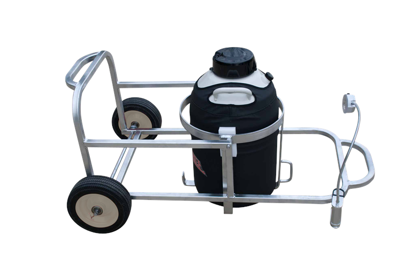 The Chart/MVE CryoTipper is a metal cart with four wheels carrying a large insulated cryogenic aluminum tank, featuring a handle and spout, shown on a white background.