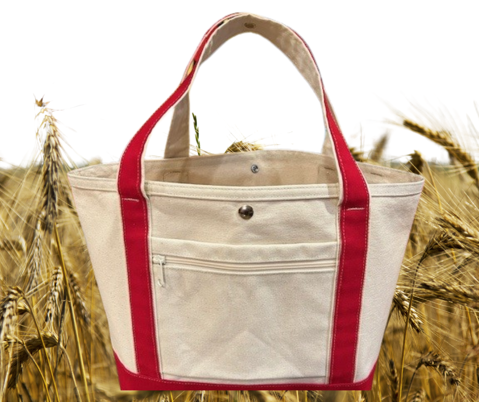 The Semen Tanks - Select Genetics Totes for Everyday Use, shown in beige duck canvas with red straps and a front zip pocket, offers extra spacious capacity—ideal for carrying your essentials wherever you go.
