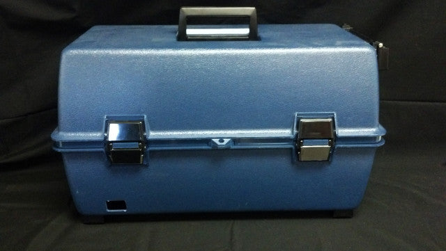 The RR Goat AI kit with Electric Thaw Unit includes a durable blue plastic case with a black handle, two silver latches, and a small cutout on the lower left, displayed against a black background.